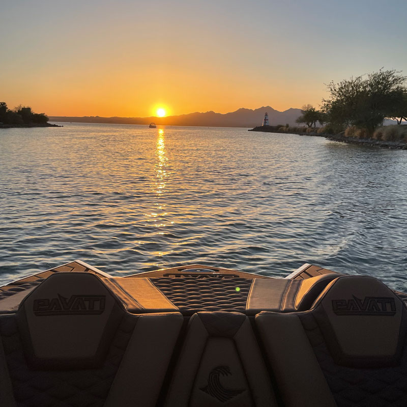 boat on the water looking at sunset